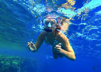 girl and snorkeling